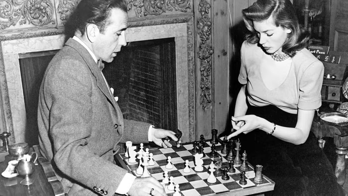 Bogart and Bacall playing chess