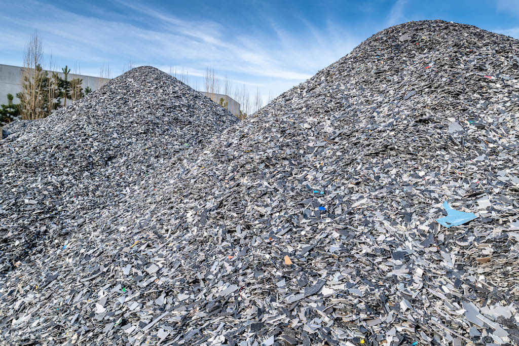 An e-waste sorting and recycling facility, Belgium. Image by Recupel