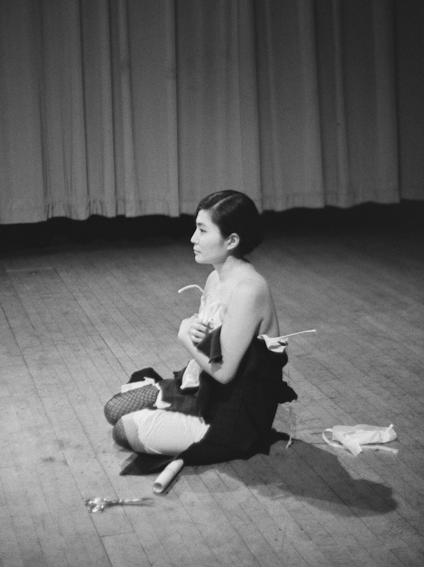 Yoko Ono, Cut Piece 1964. Performed by Yoko Ono in ‘New Works by Yoko Ono’, Carnegie Recital Hall, NYC, March 21 1965. Photo © Minoru Niizuma