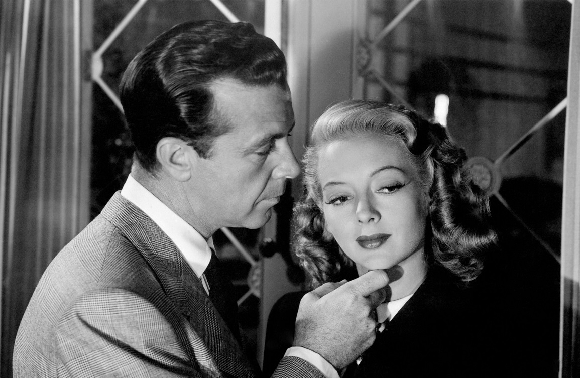 Dick Powell and Evelyn Keyes in Johnny O'Clock