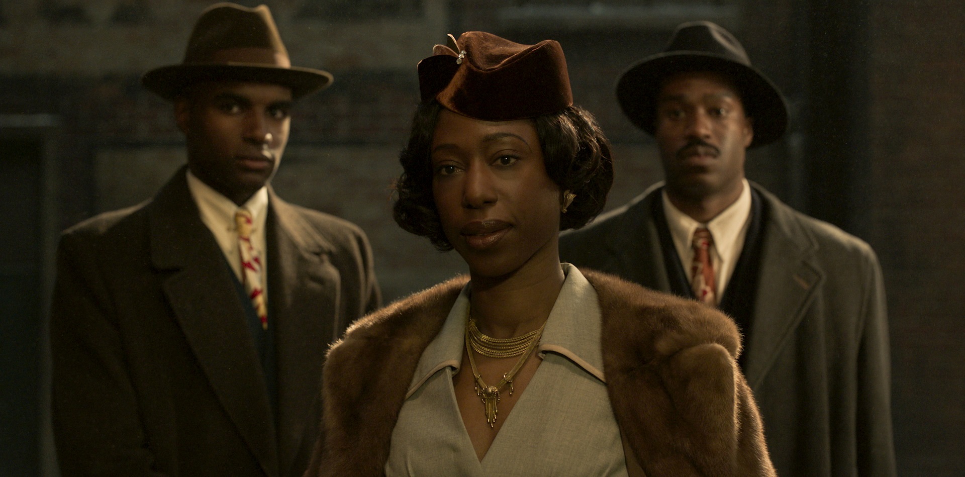 Nikki Amuka-Bird (centre) as Violet LaFontaine in The Outfit