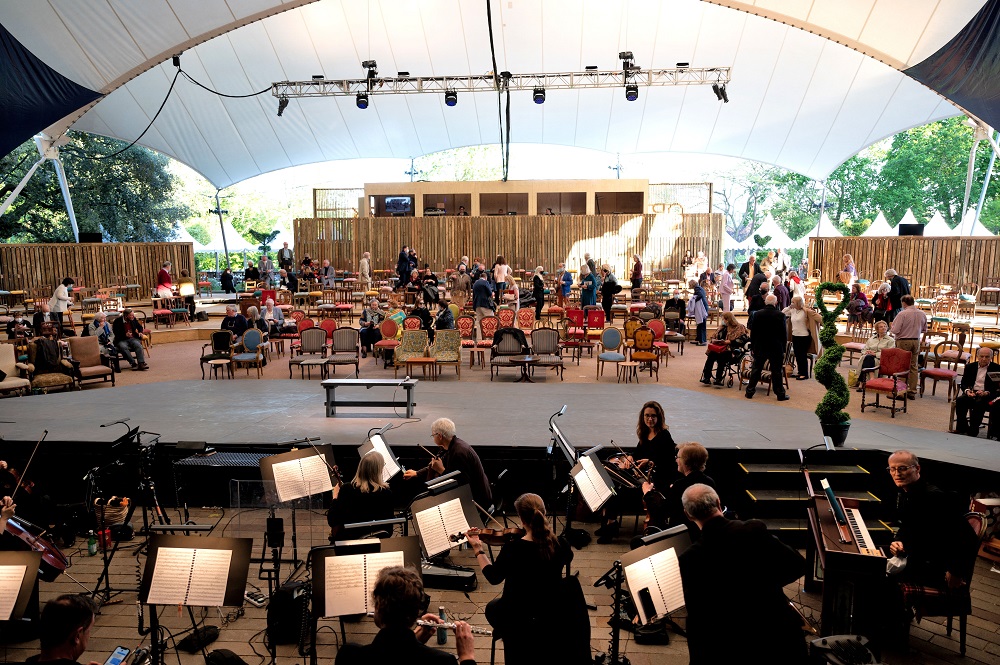 Orchestra and audience at Opera Holland Park