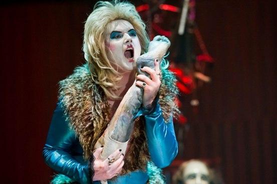 'A glam-rock vision in blue shiny fabric and Heseltinian blond wig': Mark Le Brocq as Ponto the Lion