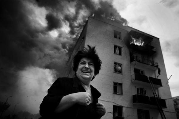 Wojciech Grzedzinski: 'Georgian woman cries after Russian air strike on civilian buildings in Gori'. Winner, Current Affairs category