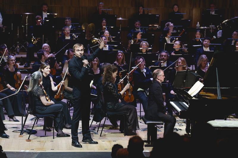 Vassily Petrenko speaks before the performance
