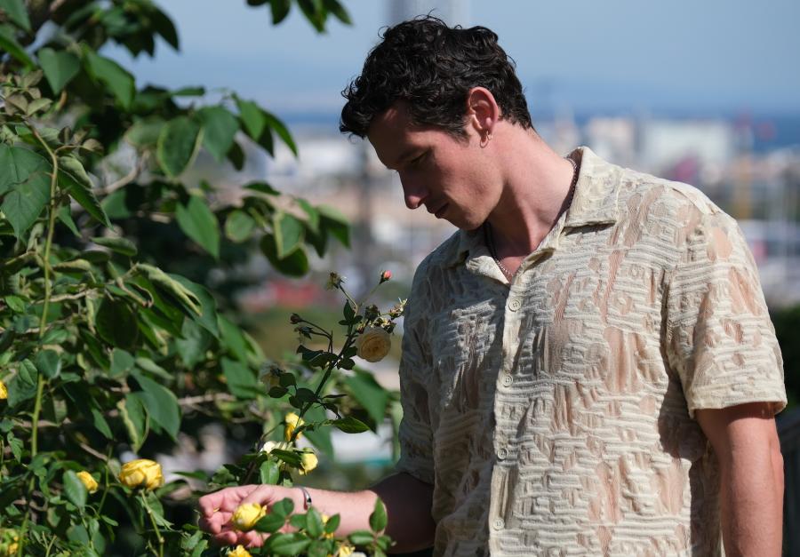 Josh O'Connor as Edward Taylor in Rosebush Pruning